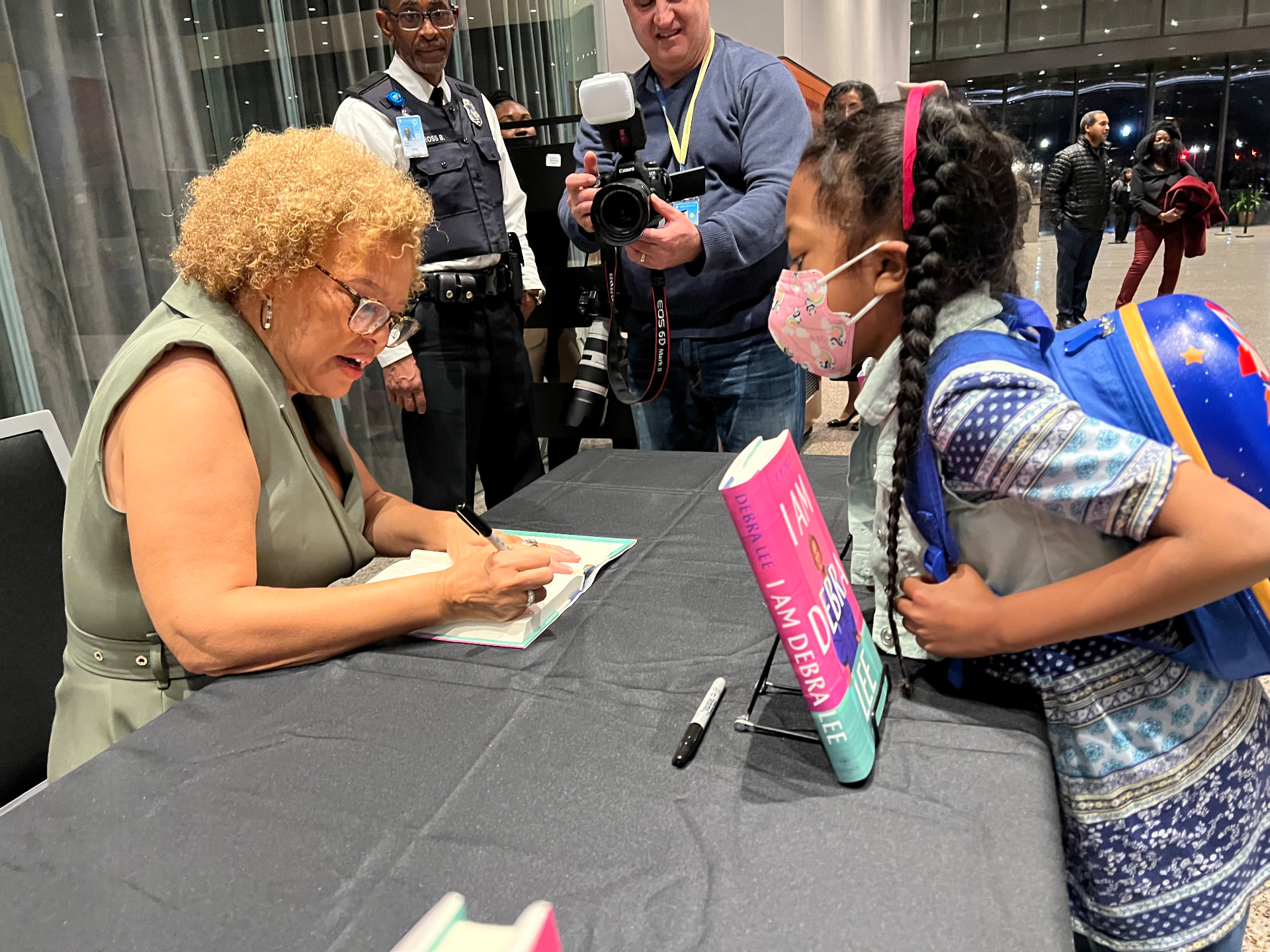 Ishara at Debra Lee's book signing with her memoir I Am Debra Lee